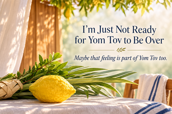 Etrog and lulav in a softly lit sukkah with the words I’m Just Not Ready for Yom Tov to Be Over